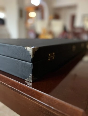 Handmade hard case.