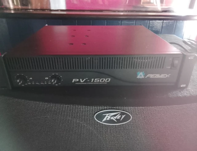 A set of peavy subs plus amp , audio controller and Martin lighting equipment . 