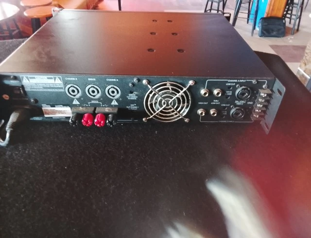 A set of peavy subs plus amp , audio controller and Martin lighting equipment . 
